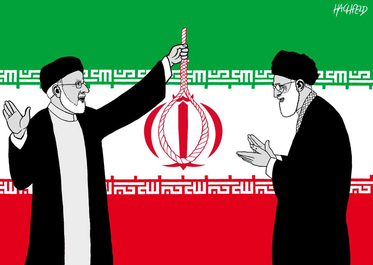کارتون «طرح جدید برای پرچم ایران»، اثر راینر هاخفلد، کارتونیست آلمانی ــ منبع: کارتونموومنت