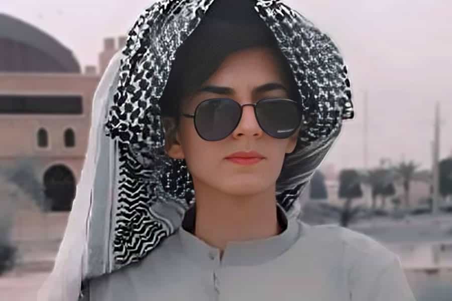 چهره محمد عسچراوی با لباس عربی و عینک دودی بر چشم.