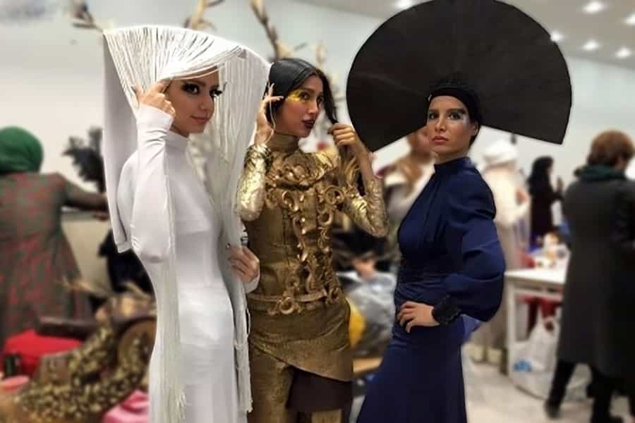 سه زن در یک فشن شو لباس‌های متفاوتی پوشیده‌اند