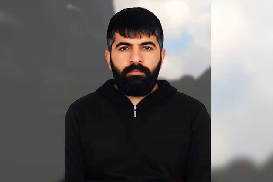 تصویری از چهرهی میلاد کرمی شهروند کُردی که در اثر شلیک مستقیم نیروی انتظامی کشته شد